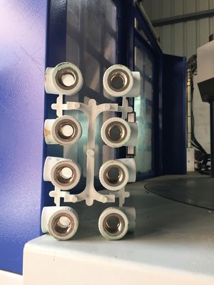 Machine de moulage par injection verticale à table à doubles glissades